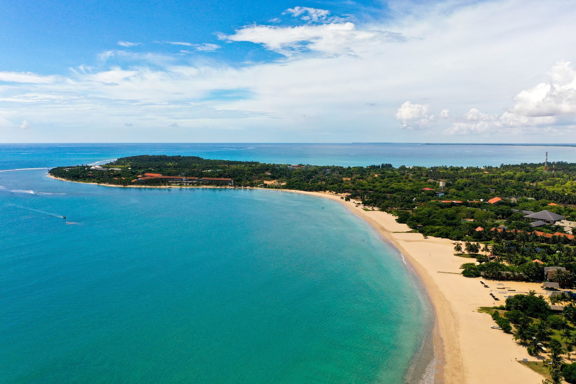 Aerial view of beach, ocean and hotels in Pasikuda, Sri Lanka