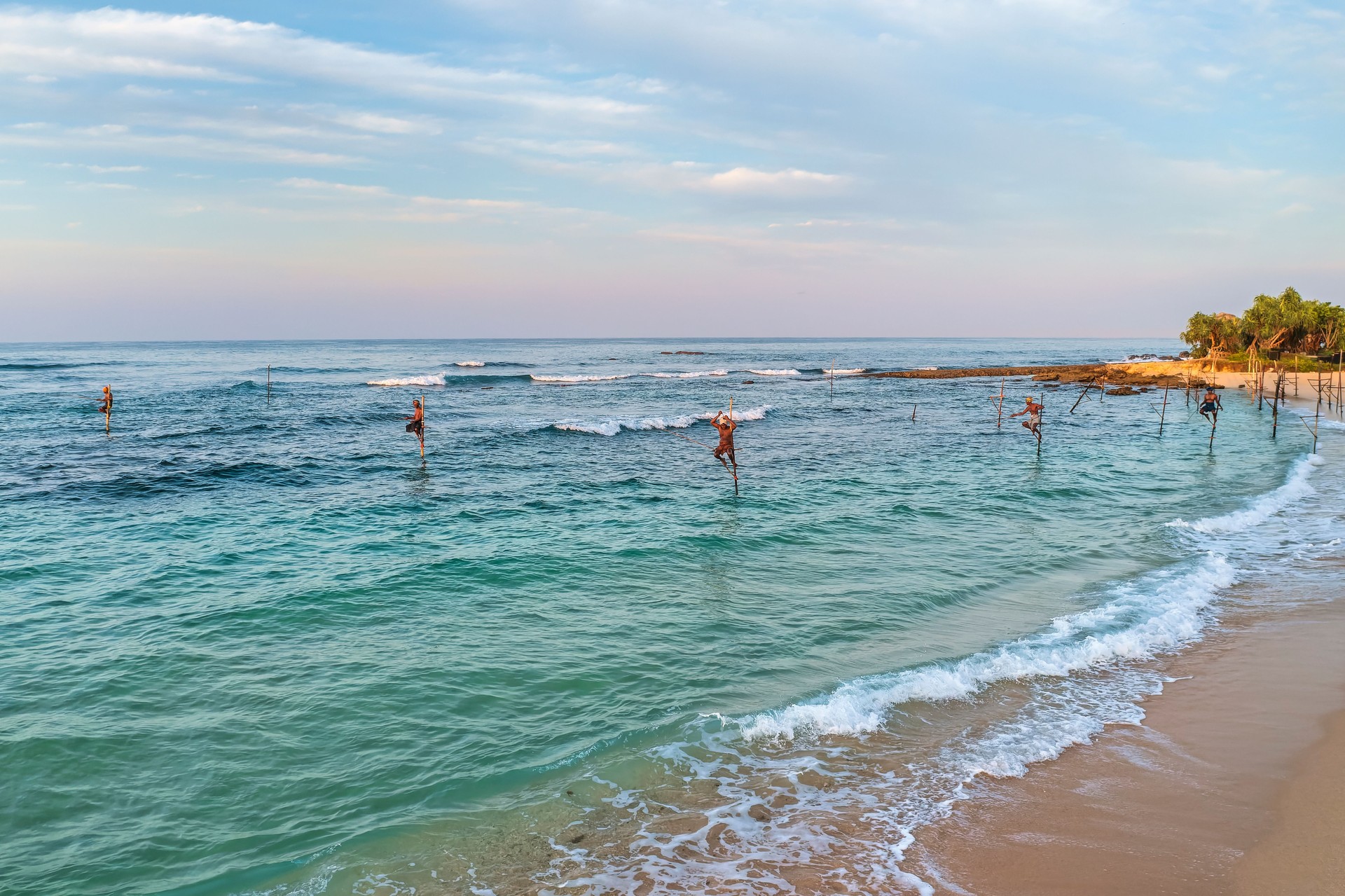 The stilt fishermen at work, Sri Lanka, Asia
